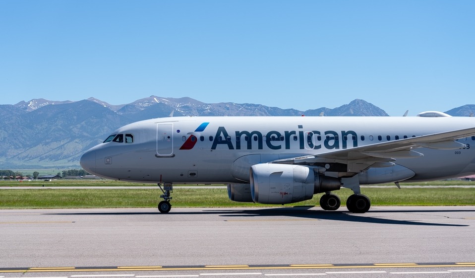 American Airlines aicraft body and Bridger Mountains in the background 